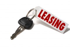 Car Key with Leasing Tag on White